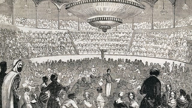 Gravure de 1845 : Berlioz dirige un orchestre au Cirque-Olympique des Champs-Élysées.